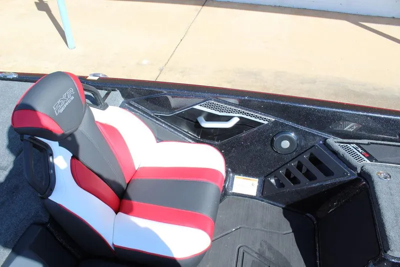 Slide: The Image of 2025 Skeeter FXR21L boat seat with red, black, and white design. - 18
