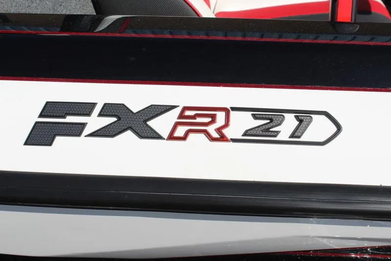 Slide: The Image of 2025 Skeeter FXR21L logo on boat exterior, featuring bold black and red lettering. - 23