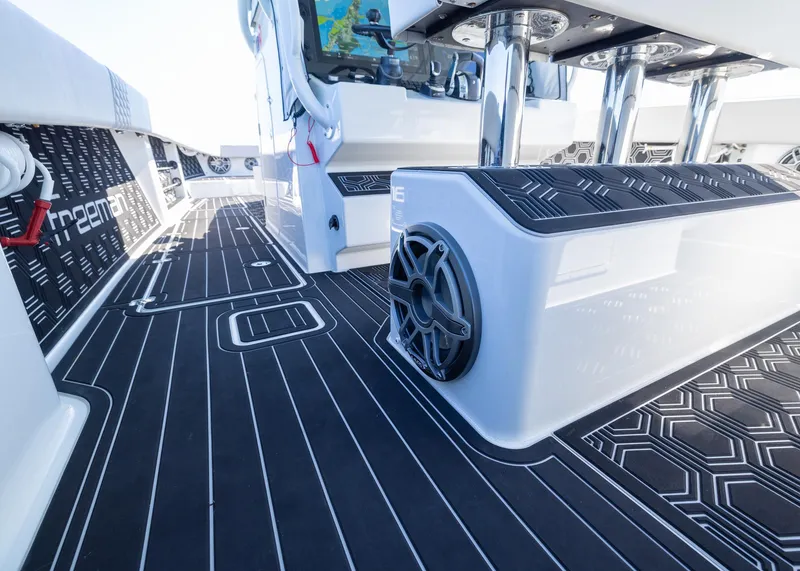 Slide: The Image of Freeman 42 LR 2019 boat interior with sleek black flooring and modern design elements. - 36