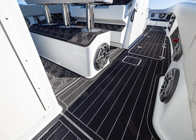 Slide: The Image of Luxurious interior of 2019 Freeman 42 LR boat with sleek black flooring and modern design. - 37