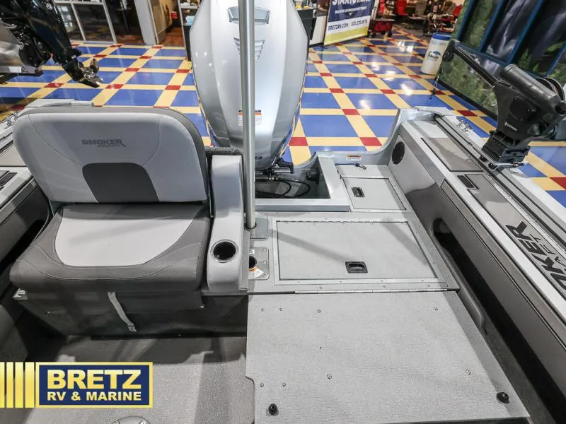Slide: The Image of 2020 Pro Angler XL 182 XL boat interior with seating and motor, displayed at Bretz RV & Marine. - 11