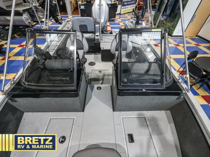 Slide: The Image of 2020 Pro Angler XL 182 boat interior with dual consoles at Bretz RV & Marine showroom. - 12