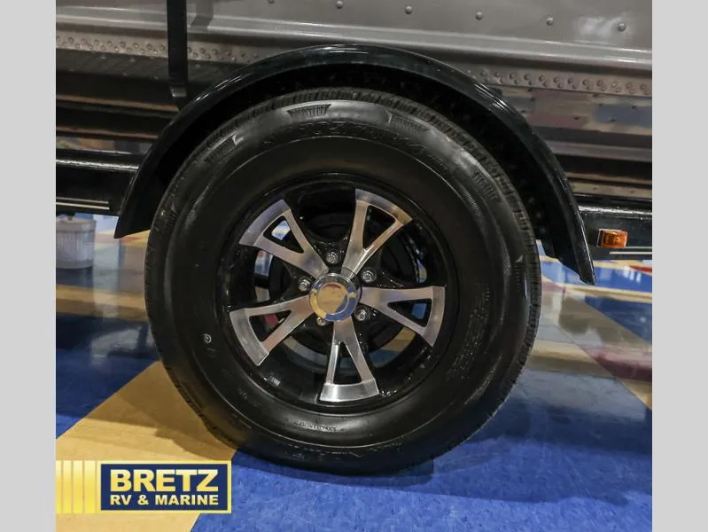 Slide: The Image of 2020 Pro Angler XL 182 XL trailer wheel with sleek black and silver alloy rim. - 25