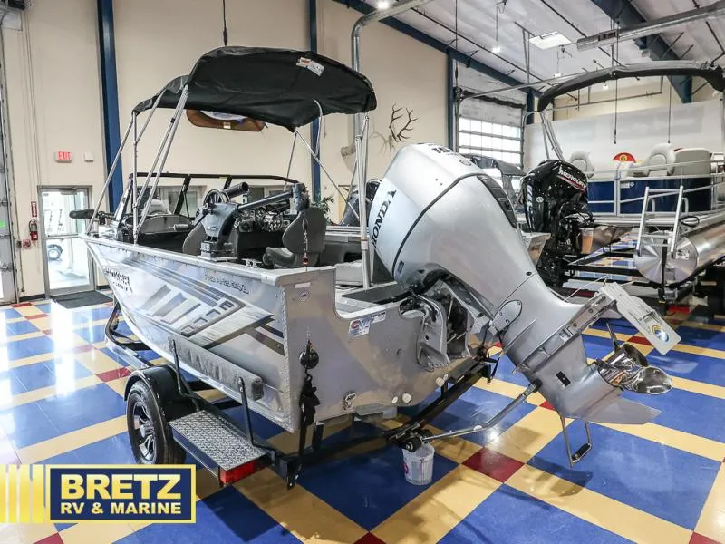 Slide: The Image of 2020 Pro Angler XL 182 XL boat with Honda outboard motor in showroom. - 5