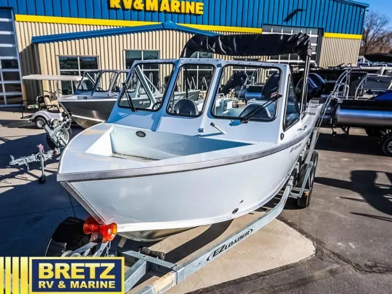 Slide: The Image of 2024 Sea Runner 210 SRET boat on trailer at Bretz RV & Marine dealership. - 4