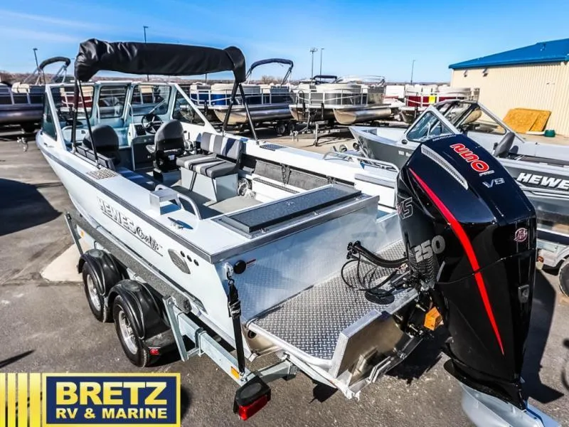 Slide: The Image of 2024 Sea Runner 210 SRET boat with powerful outboard motor at Bretz RV & Marine. - 5
