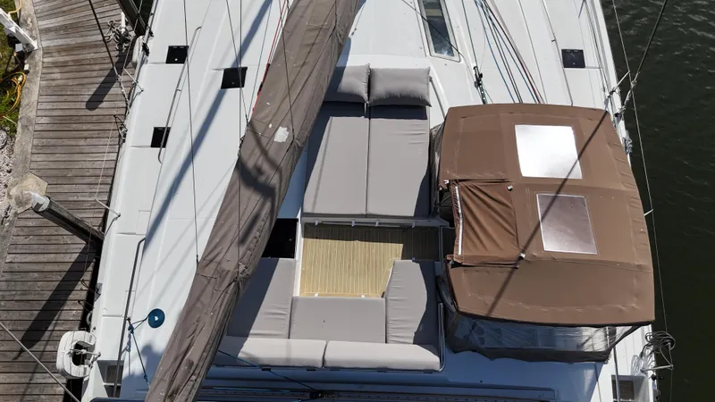 Slide: The Image of Aerial view of 2018 Fountaine Pajot Saona 47 catamaran with sunbathing area and canopy. - 25