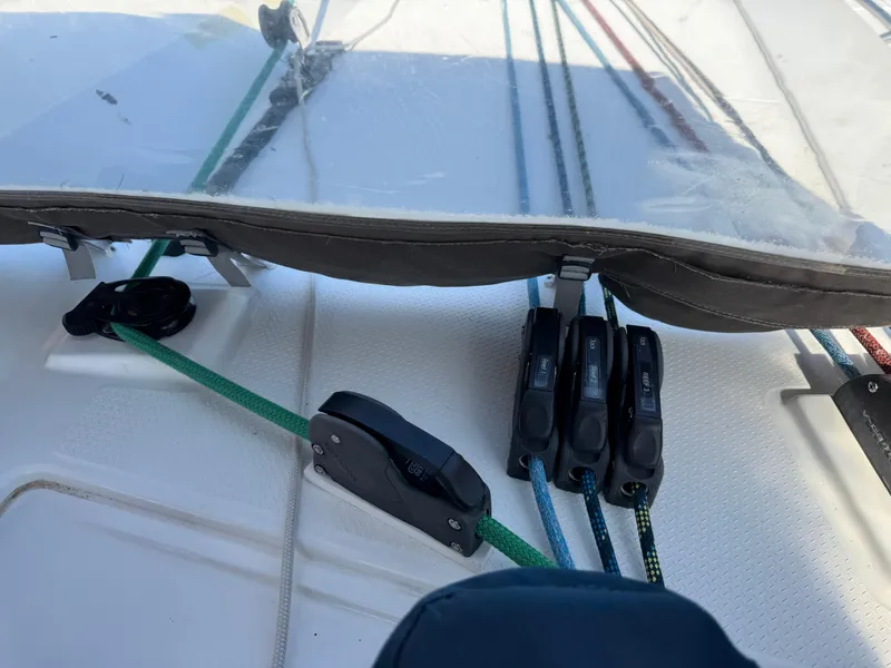 Slide: The Image of Sailing rigging on 2018 Fountaine Pajot Saona 47 catamaran deck, featuring colorful ropes and cleats. - 37