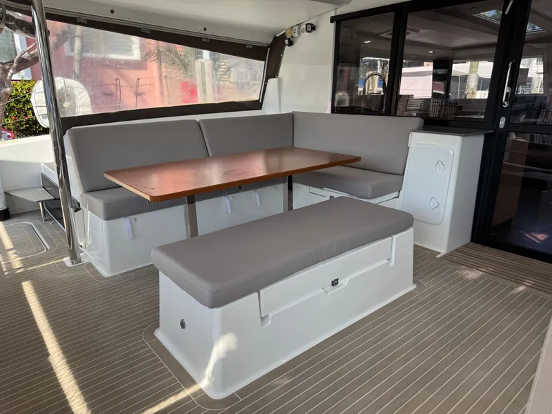 Slide: The Image of 2018 Fountaine Pajot Saona 47 yacht interior with seating and dining area. - 40