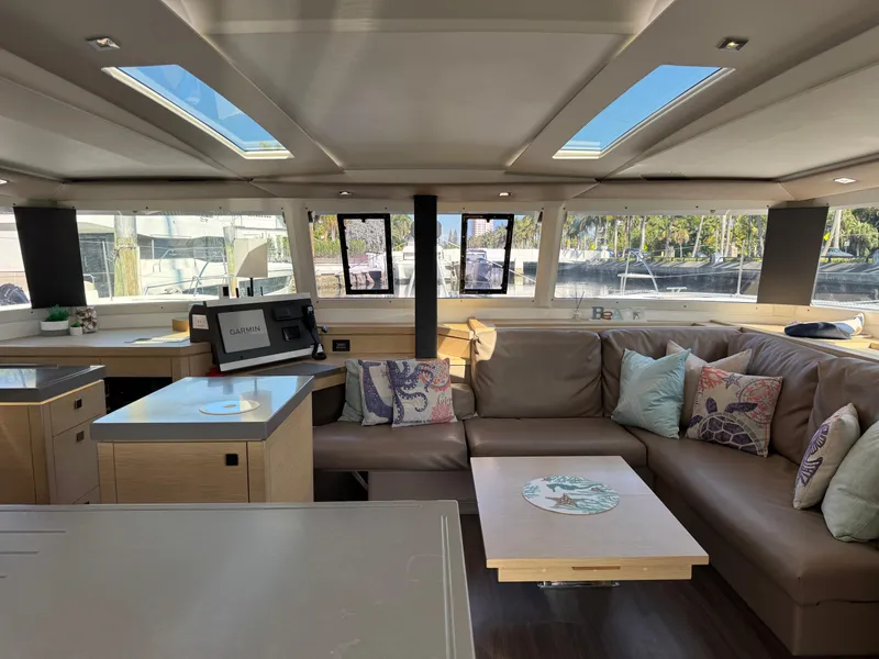 Slide: The Image of Luxurious interior of 2018 Fountaine Pajot Saona 47 catamaran with plush seating and modern design. - 46