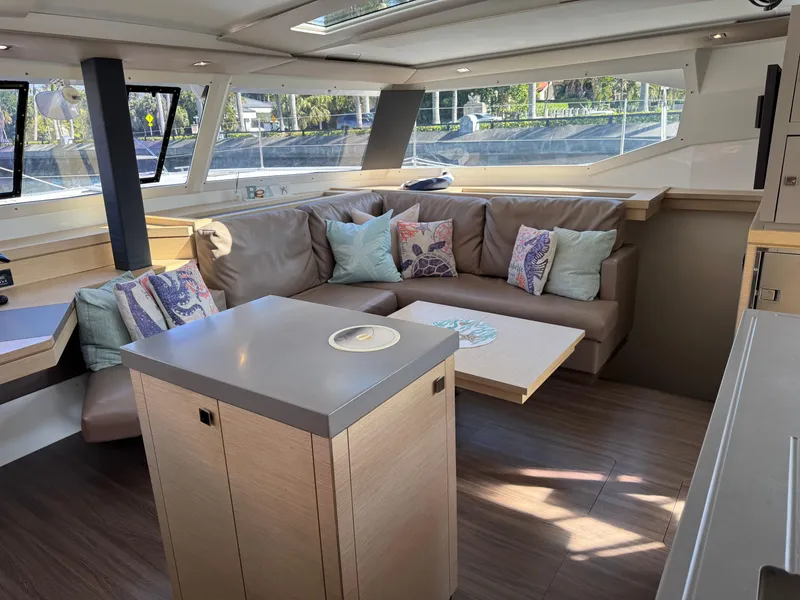 Slide: The Image of Luxurious interior of 2018 Fountaine Pajot Saona 47 catamaran with modern seating and decor. - 48
