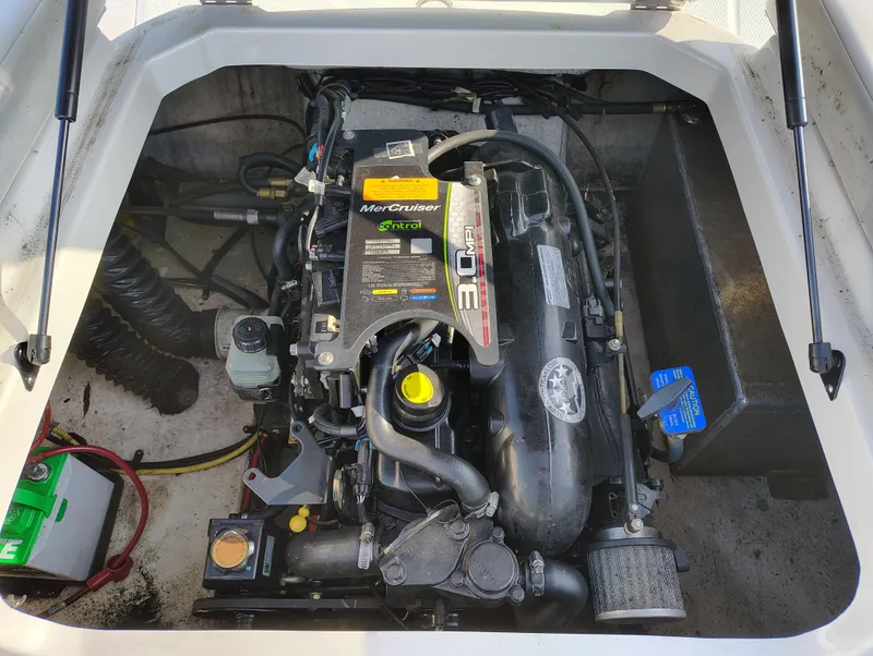 Slide: The Image of Engine compartment of 2012 Chaparral 18 Sport H2O boat with MerCruiser 3.0 MPI engine. - 19