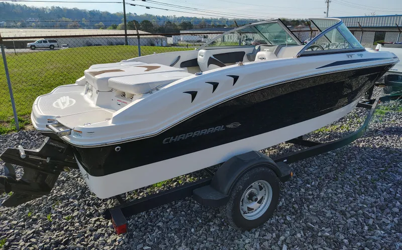 Slide: The Image of 2012 Chaparral 18 Sport H2O boat on trailer, parked outdoors. - 3