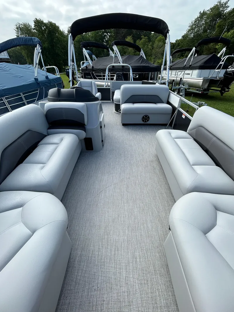 Slide: The Image of 2023 Landau Island Breeze 232 Cruise pontoon boat with spacious seating and sleek design. - 3