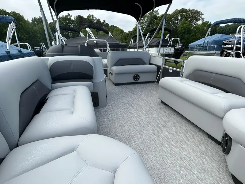 Slide: The Image of 2023 Landau Island Breeze 232 Cruise pontoon boat with spacious seating and modern design. - 9
