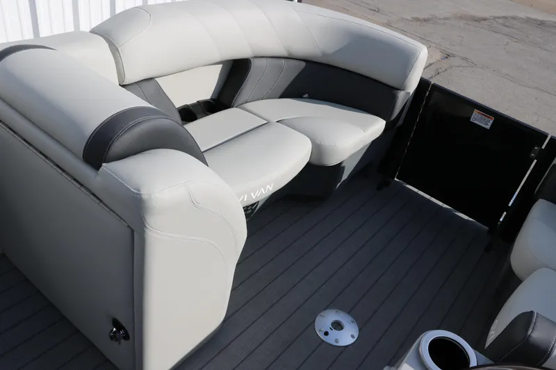 Slide: The Image of 2025 Sylvan 820 CLZ DH Premium Pontoon with luxurious seating and sleek design. - 21