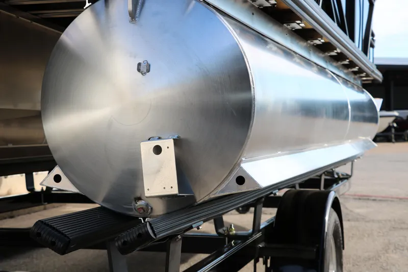 Slide: The Image of 2025 Sylvan 820 CLZ DH Premium Pontoon on trailer, showcasing sleek aluminum design. - 31