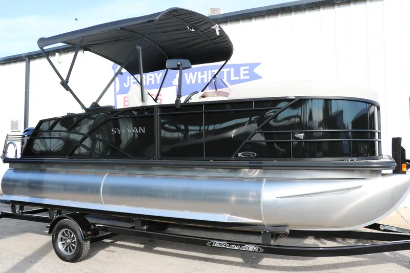 Slide: The Image of 2025 Sylvan 820 CLZ DH Premium Pontoon with black canopy on trailer. - 7