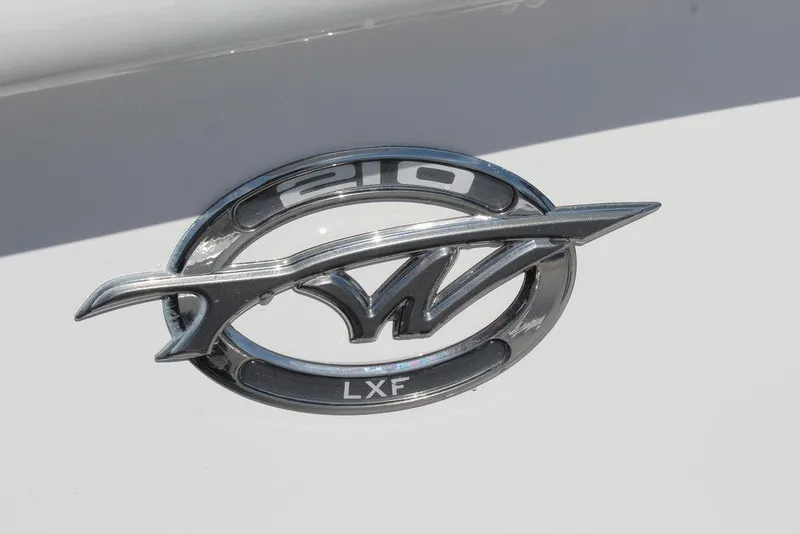 Slide: The Image of 2025 Tidewater 210 LXF logo on boat exterior. - 26
