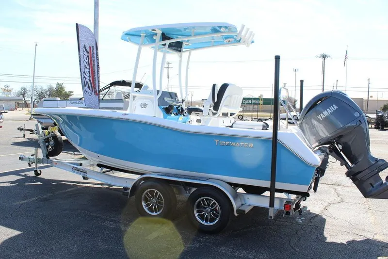 Slide: The Image of 2025 Tidewater 210 LXF boat with Yamaha engine on trailer, displayed outdoors. - 6