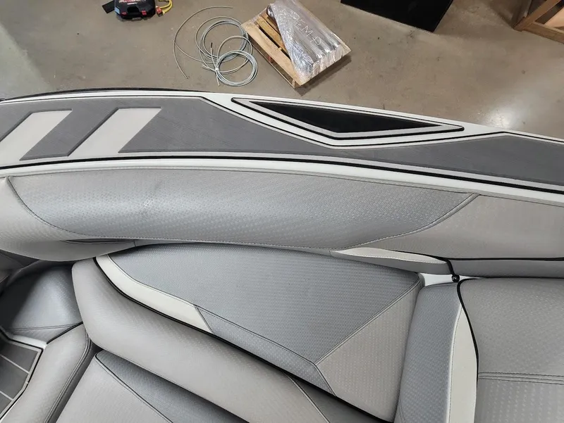 Slide: The Image of 2021 Centurion Ri245 interior with sleek gray and white upholstery design. - 10