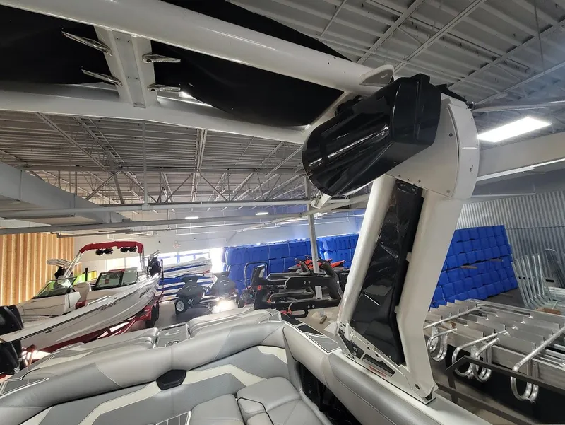 Slide: The Image of 2021 Centurion Ri245 boat interior with speaker system in a showroom. - 17