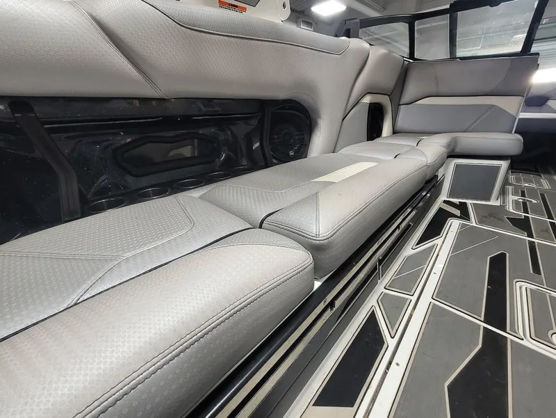 Slide: The Image of 2021 Centurion Ri245 interior with gray seating and modern flooring design. - 20