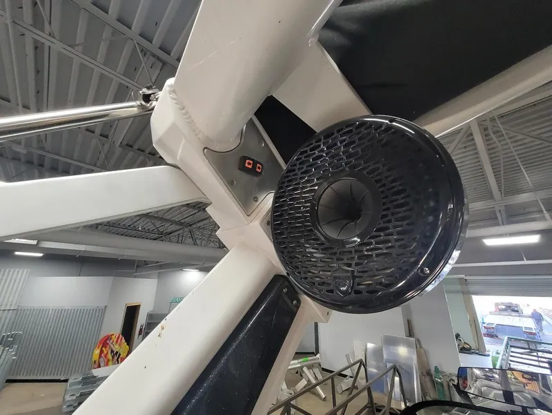 Slide: The Image of 2021 Centurion Ri245 boat speaker system in a showroom setting. - 21