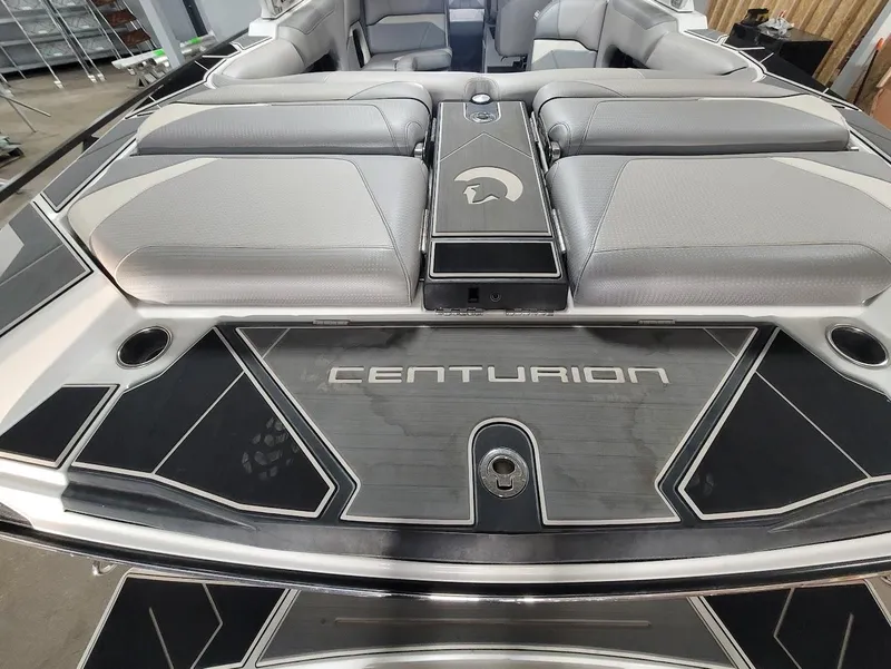 Slide: The Image of 2021 Centurion Ri245 boat interior with sleek seating and stylish design. - 22