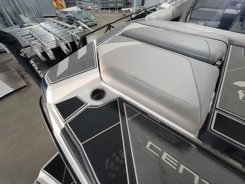 Slide: The Image of 2021 Centurion Ri245 boat interior with sleek seating and modern design. - 24