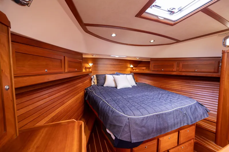Slide: The Image of Luxurious wood-finished cabin interior of 2014 Sabre 38 Salon Express yacht. - 21