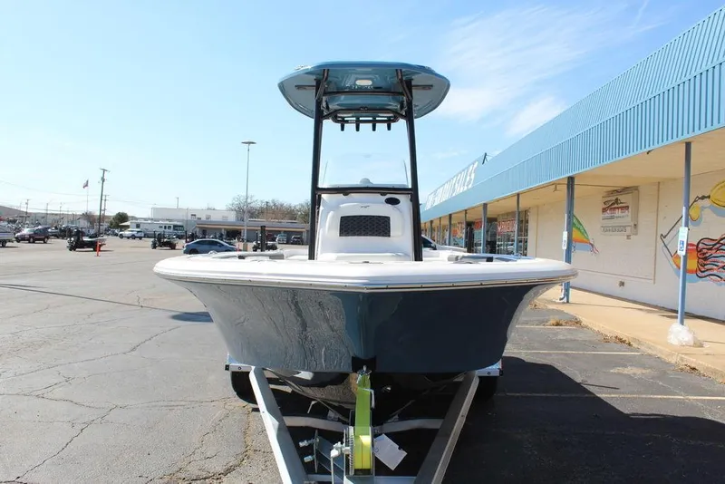 Slide: The Image of 2025 Tidewater 2300 CB boat on trailer in parking lot, front view. - 13