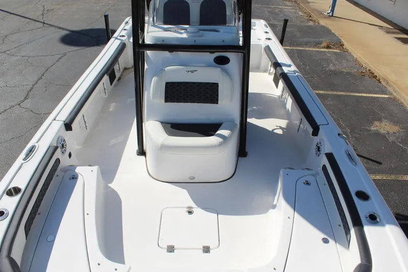 Slide: The Image of 2025 Tidewater 2300 CB boat interior with seating and storage compartments. - 25