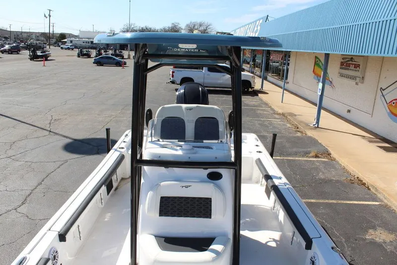 Slide: The Image of 2025 Tidewater 2300 CB boat parked in a lot, showcasing its sleek design and features. - 27