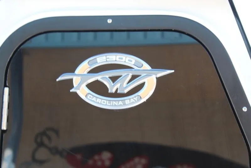 Slide: The Image of 2025 Tidewater 2300 CB Carolina Bay logo on boat surface. - 30