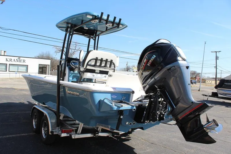 Slide: The Image of 2025 Tidewater 2300 CB boat with Yamaha outboard motor on a trailer. - 9