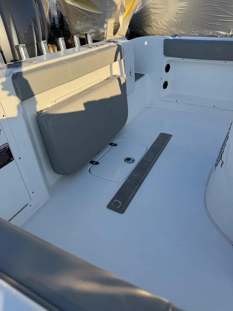Slide: The Image of 2022 Cape Horn 22 OS boat interior with seating and storage compartments. - 15