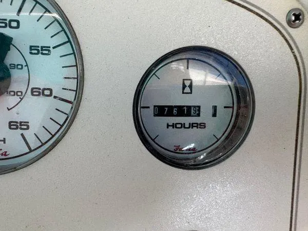 Slide: The Image of Hour meter on 1995 Cruisers Yachts 3175 Rogue dashboard, showing 761.9 hours. - 18