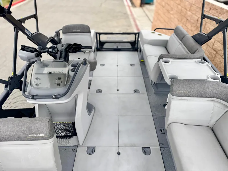 Slide: The Image of 2023 Sea-Doo Switch Cruise 18 interior with spacious seating and modern controls. - 17