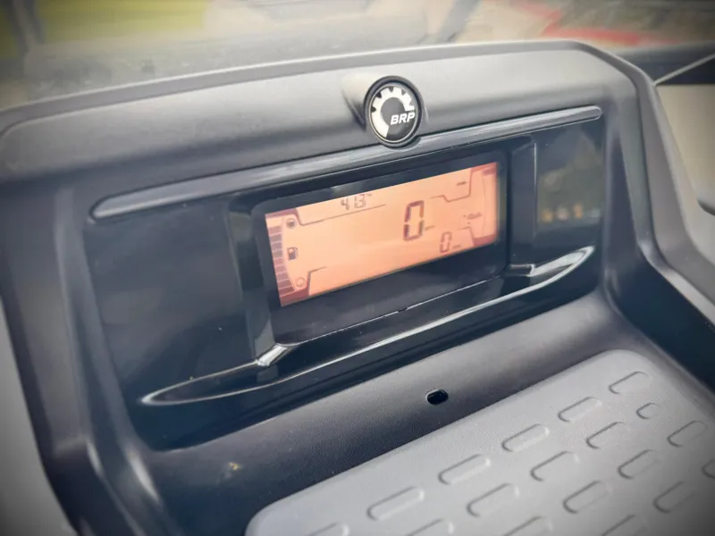 Slide: The Image of Dashboard of 2023 Sea-Doo Switch Cruise 18, featuring digital display and BRP logo. - 24