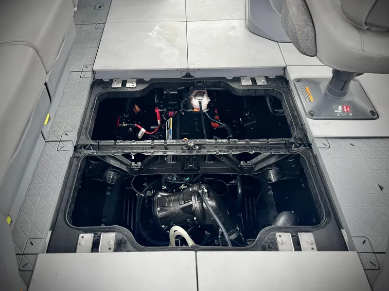 Slide: The Image of 2023 Sea-Doo Switch Cruise 18 engine compartment, showcasing internal components and seating area. - 25