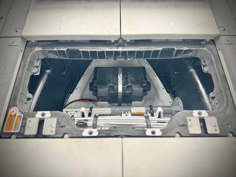 Slide: The Image of 2023 Sea-Doo Switch Cruise 18 engine compartment, showcasing internal components and design. - 28