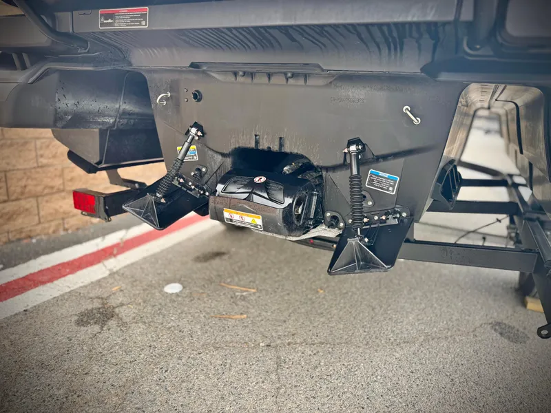 Slide: The Image of 2023 Sea-Doo Switch Cruise 18 rear view, showcasing propulsion system and trailer attachment. - 7