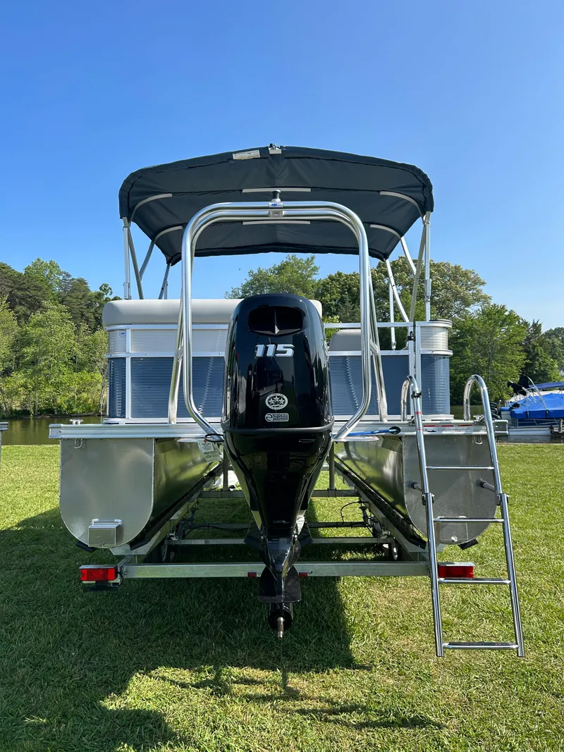 Slide: The Image of 2023 Landau Island Breeze 232 Cruise pontoon boat with plush seating and modern design. - 3