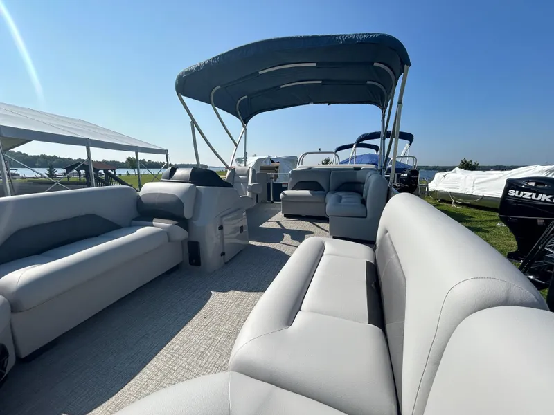 Slide: The Image of 2023 Landau Island Breeze 232 Cruise pontoon boat with spacious seating and modern design. - 8