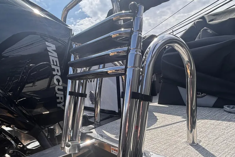Slide: The Image of 2025 Avalon 2385 LSZ boat with Mercury engine and stainless steel ladder. - 13