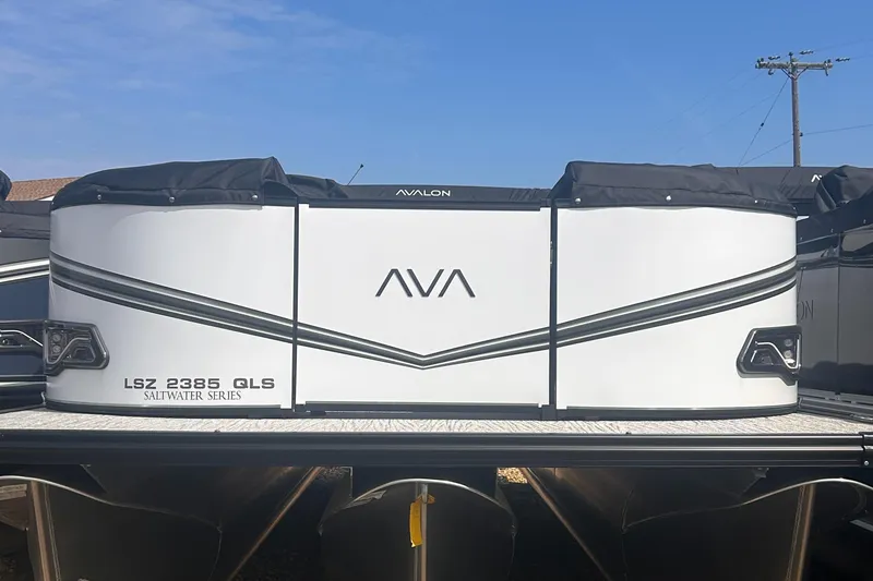 Slide: The Image of 2025 Avalon 2385 LSZ pontoon boat, Saltwater Series, with sleek white design and modern features. - 14