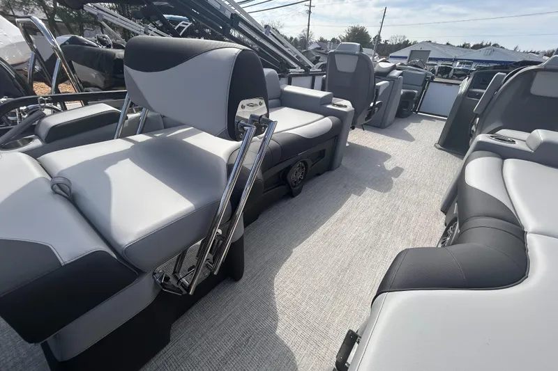 Slide: The Image of 2025 Avalon 2385 LSZ boat interior with luxurious seating and modern design. - 18