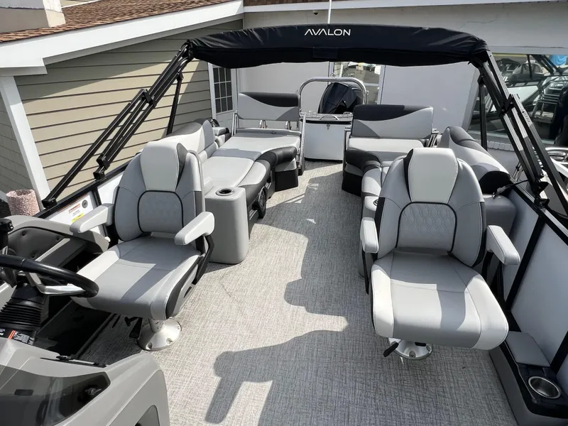 Slide: The Image of 2025 Avalon 2385 LSZ pontoon boat interior with luxurious seating and modern design. - 8