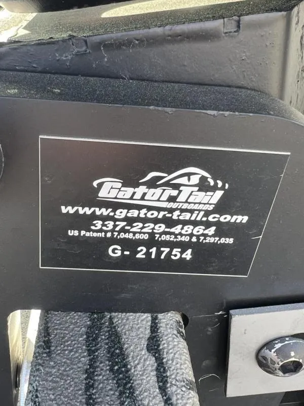 Slide: The Image of Sticker on a 2025 Havoc Boats 1653 MSTC, featuring Gator Tail Outboards contact information. - 18